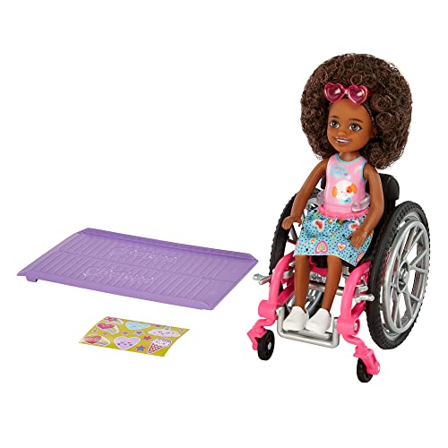 0194735054329 - BARBIE CHELSEA DOLL & WHEELCHAIR, WITH CHELSEA DOLL (CURLY BRUNETTE HAIR), IN SKIRT & SUNGLASSES, WITH RAMP & STICKER SHEET, TOY FOR 3 YEAR OLDS & UP