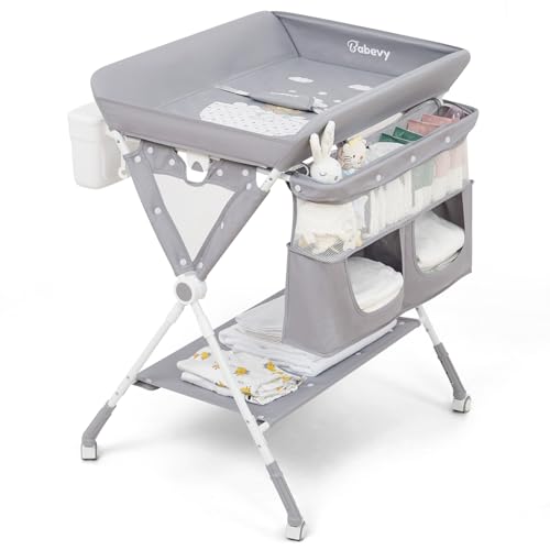 0196336801821 - BABEVY PORTABLE BABY CHANGING TABLE, FOLDABLE DIAPER CHANGE TABLE WITH WHEELS, ADJUSTABLE HEIGHT, CLEANING BUCKET, CHANGING STATION FOR INFANT MOBILE NURSERY ORGANIZER FOR NEWBORN (DARK GREY)