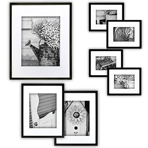 0038555397405 - GALLERY PERFECT 7 PIECE BLACK WOOD PHOTO FRAME WALL GALLERY KIT #11FW1443. INCLUDES: FRAMES, WALL TEMPLATE, DECORATIVE PRINTS AND HANGING HARDWARE.