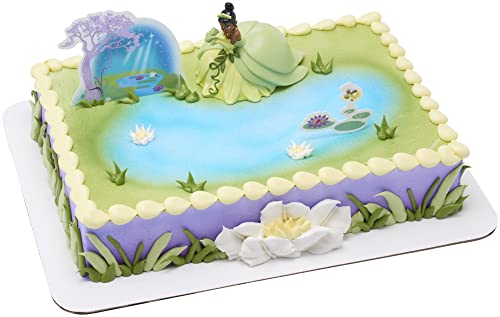 0607772476516 - DECOSET® DISNEY PRINCESS TIANA CAKE TOPPER, 3-PIECE CAKE DECORATION WITH TIANA AND FROG FIGURINE, WATER LILY PIC, AND BACKGROUND SCENERY PIC