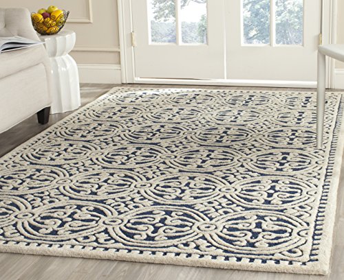 0683726358855 - SAFAVIEH CAMBRIDGE COLLECTION CAM123G HANDMADE NAVY BLUE AND IVORY WOOL AREA RUG, 7 FEET 6 INCHES BY 9 FEET 6 INCHES (7'6 X 9'6)