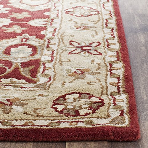 0683726952169 - SAFAVIEH STRATFORD COLLECTION STR503A HANDMADE RED AND IVORY WOOL AREA RUG, 8 FEET BY 10 FEET (8' X 10')