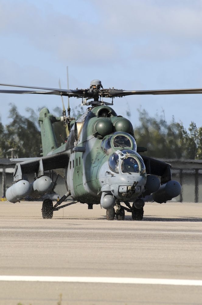 7430030229233 - BRAZILIAN AIR FORCE MIL MI-35 COMBAT HELICOPTER TAXIING AT NATAL AIR FORCE BASE, BRAZIL POSTER PRINT (22 X 34)