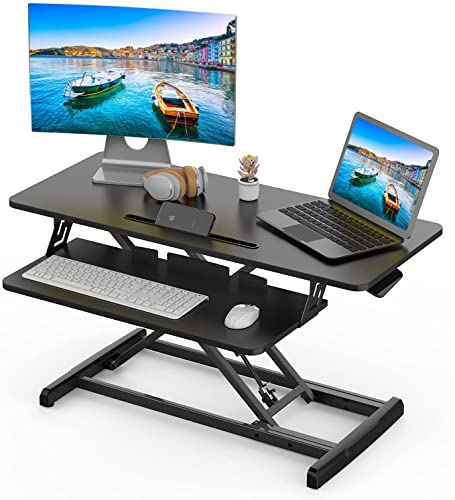 0765154359014 - STANDING DESK CONVERTER ADJUSTABLE HEIGHT DESK RISER, SIT STAND DESK CONVERTER STAND UP DESK FOR HOME OFFICE, 31’’ TABLETOP DUAL MONITOR COMPUTER WORKSTATIONS WITH KEYBOARD TRAY