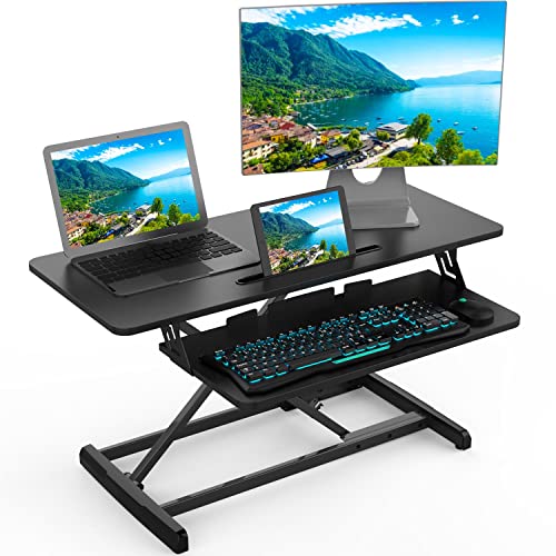 0765154363844 - STANDING DESK CONVERTER DUAL MONITOR, SIT STAND DESK CONVERTER DESK RISER, STAND UP DESK RISER FOR HOME OFFICE, 32’’ HEIGHT ADJUSTABLE STANDING DESK CONVERTER COMPUTER WORKSTATIONS WITH KEYBOARD TRAY