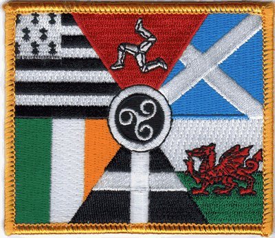 0768117089294 - THE CELTIC NATIONS FLAG PATCH, SUPERIOR QUALITY IRON-ON / SAW-ON EMBROIDERED PATCH - EACH ONE IS INDIVIDUALLY CARDED AND SEALED IN A PROFESSIONAL RETAIL PACKAGE - 4 X 3.5 INCHES - MADE IN THE USA