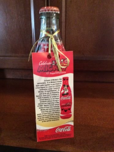 0781317335299 - CELEBRATE MICKEY 75 INSPEARATIONS COCA-COLA SHRINK-WRAPPED GLASS BOTTLE WITH SPECIAL COMMEMORATIVE TAG