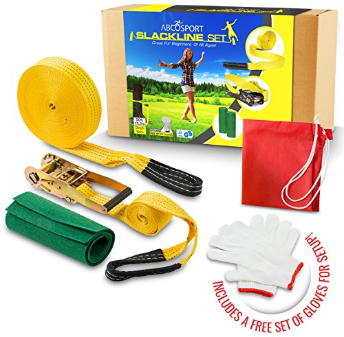 0796856325588 - SLACKLINE KIT - 50' LONG AND 2 WIDE CLASSIC SOFT NYLON WEBBING WITH A SAFETY RATCHET & TREE PROTECTION - USED FOR BEGINNERS (ALL AGES) FOR TRAINING - INCLUDES A FREE CARRY BAG + A PAIR GLOVES.